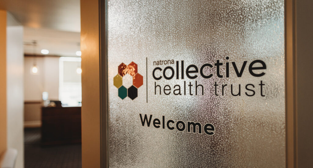 A door welcomes guests to the Health Trust