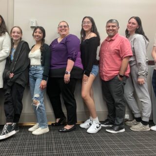Group of youth and facilitators pose