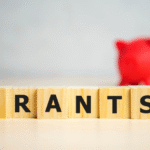 Scrabble tiles spelling the word GRANTS