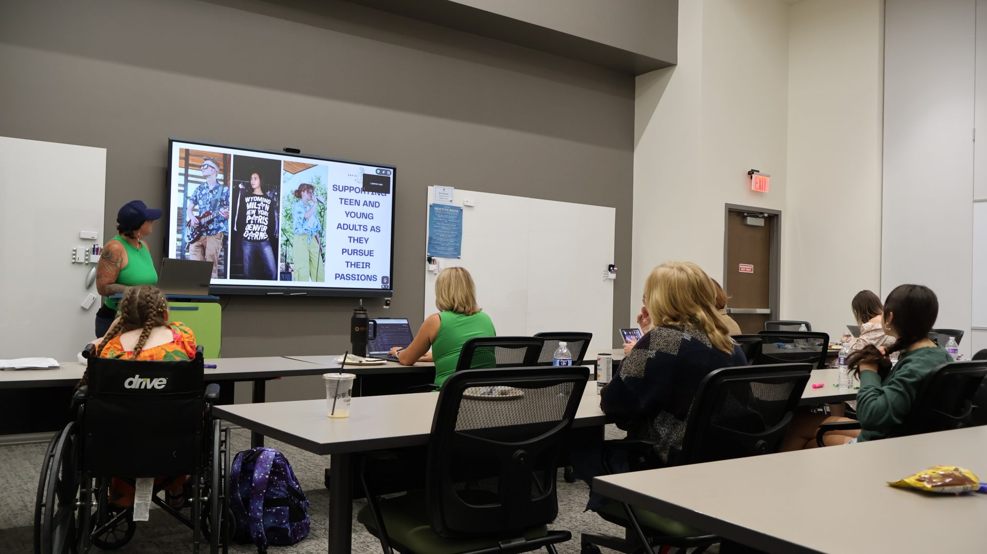 A David Street Station presenter shares a slide on supporting teens and young adults