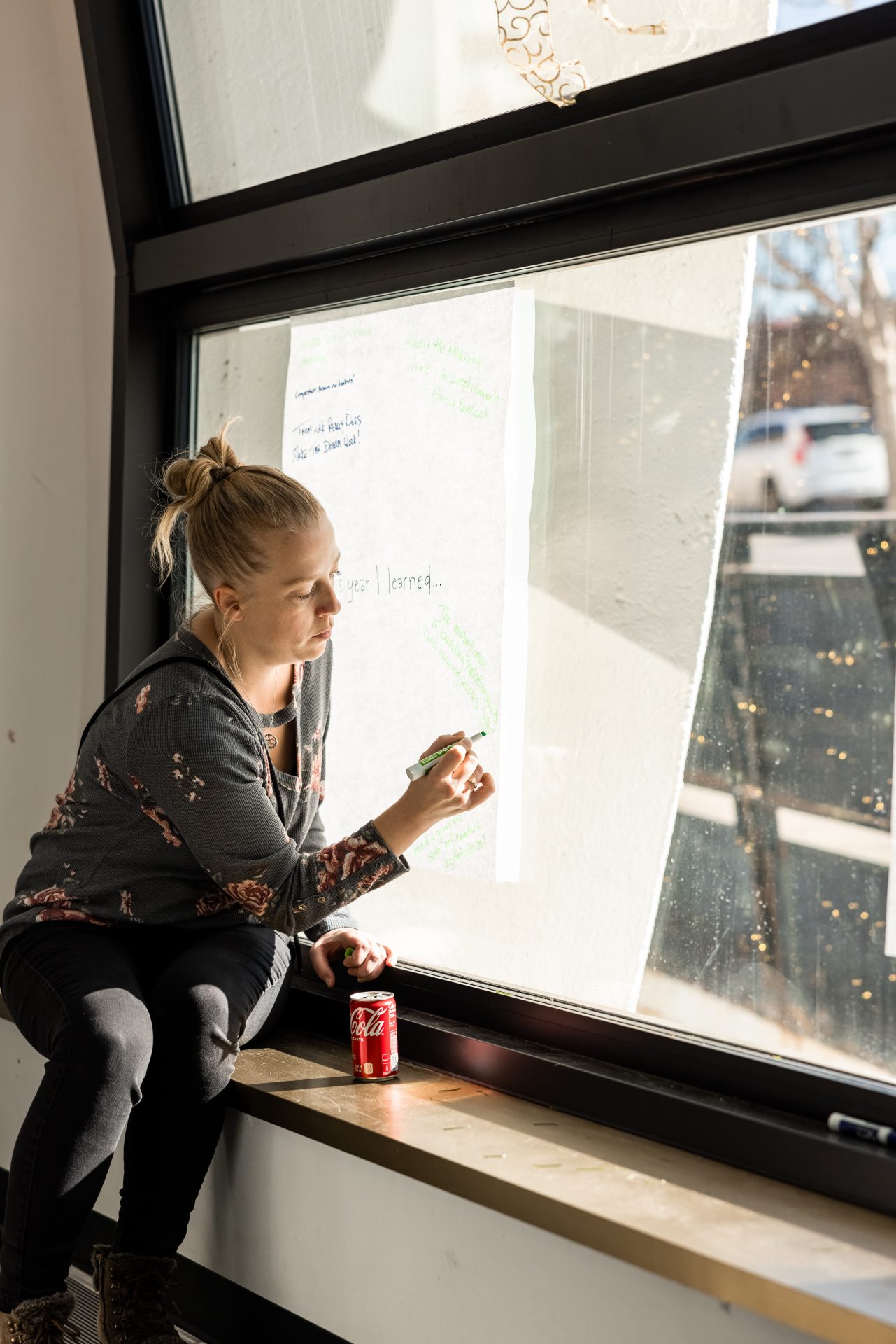A guest adding to the reflection wall